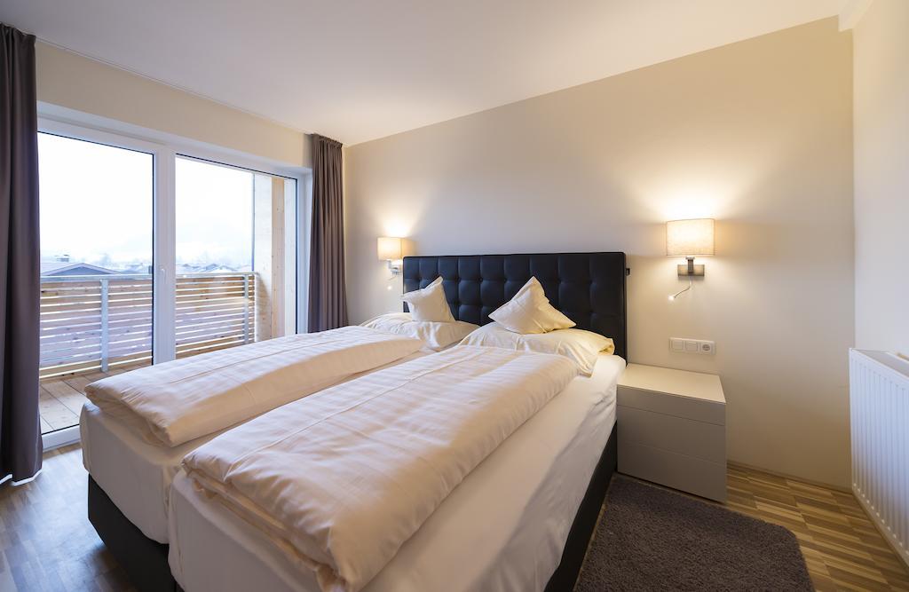 Appartementhotel Sonnenhof Kössen Quarto foto