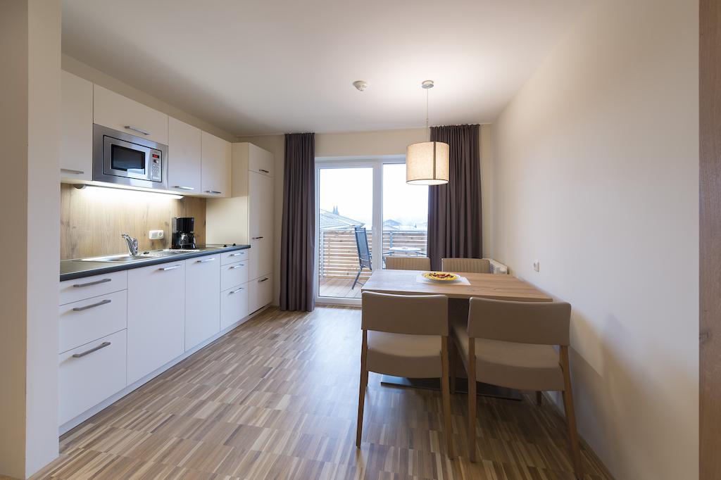 Appartementhotel Sonnenhof Kössen Quarto foto