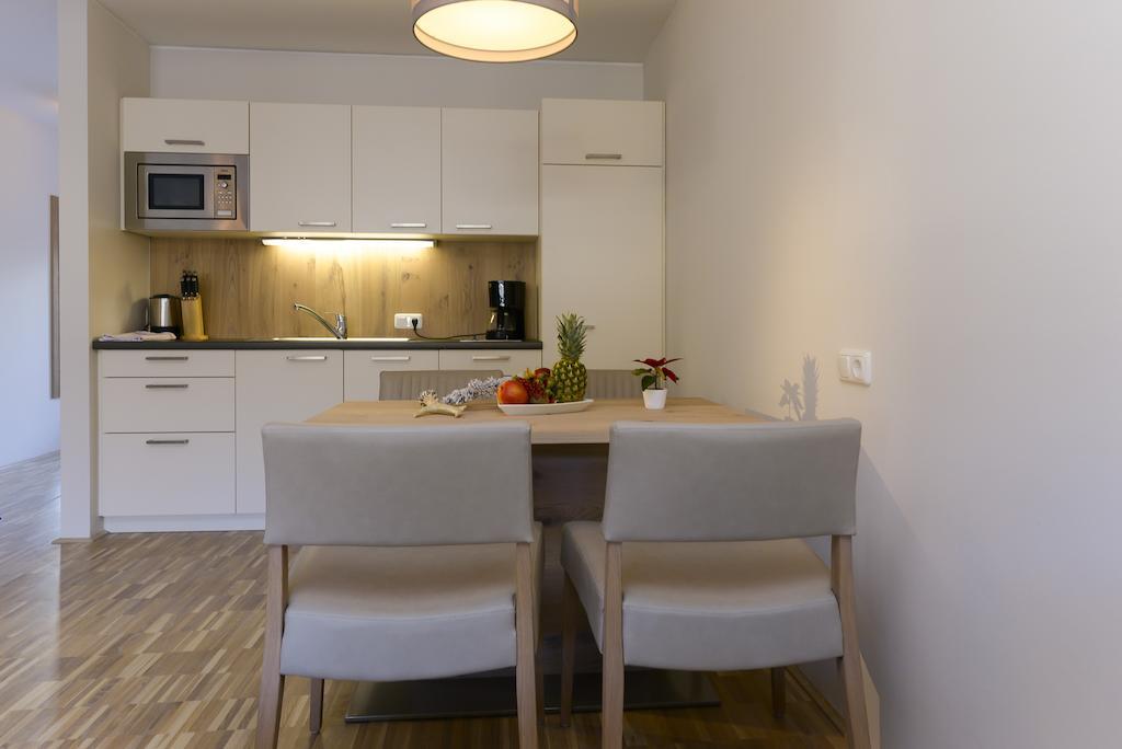 Appartementhotel Sonnenhof Kössen Quarto foto