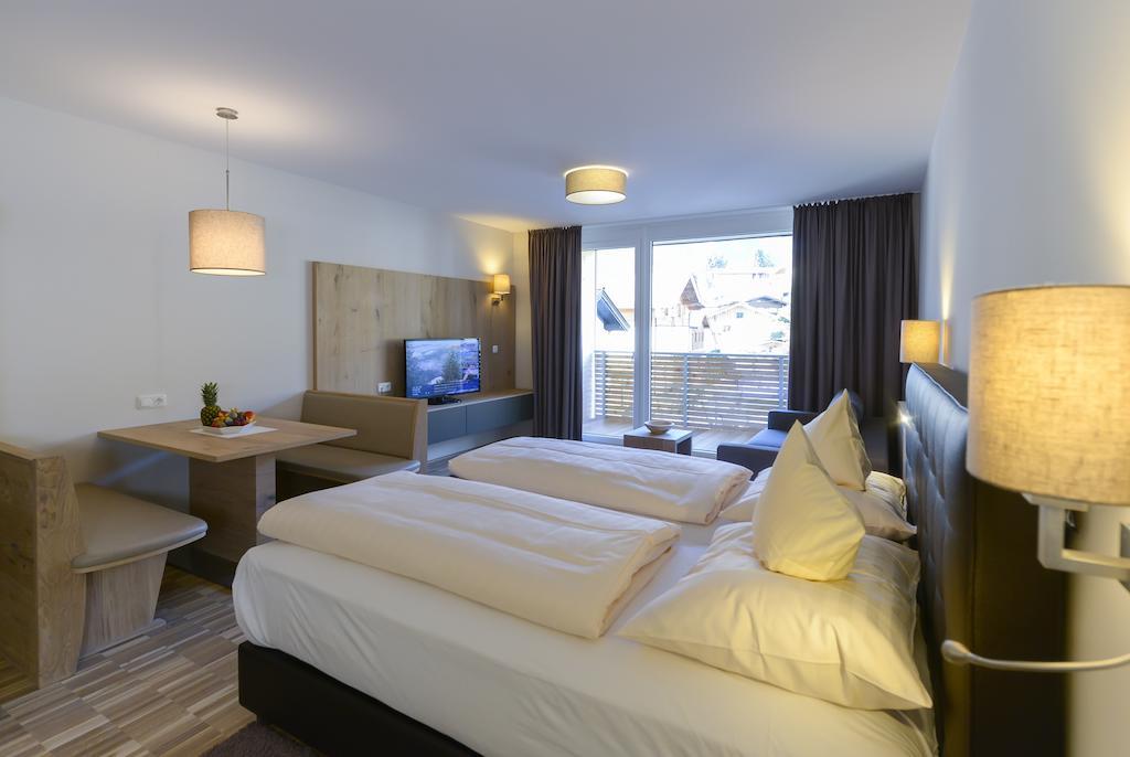 Appartementhotel Sonnenhof Kössen Quarto foto