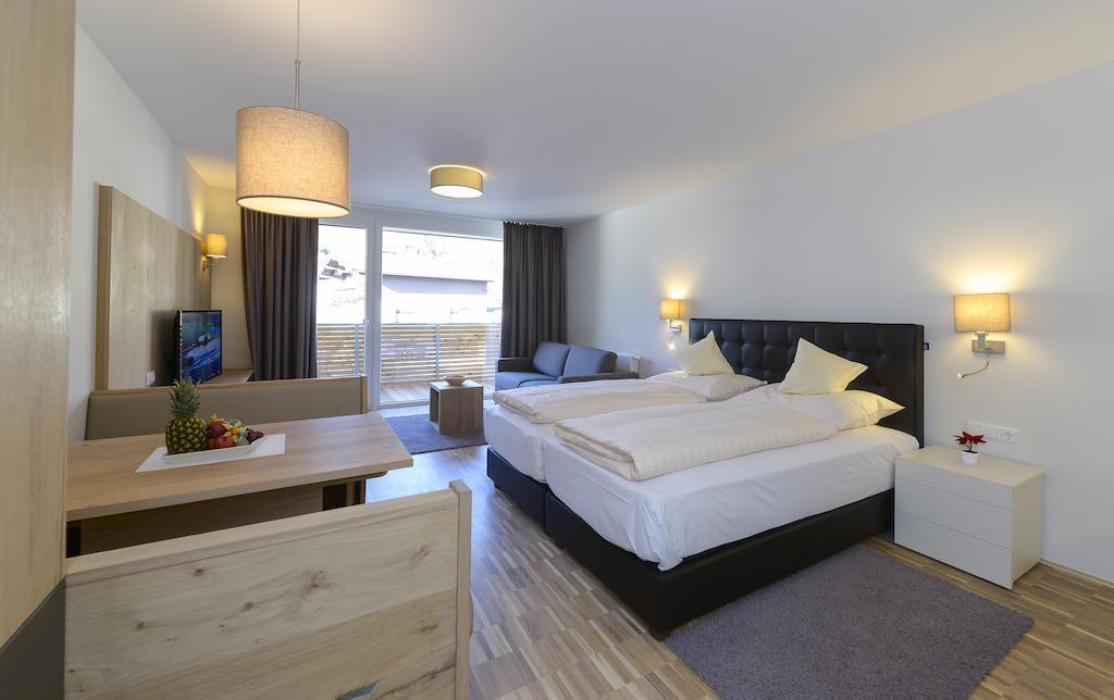 Appartementhotel Sonnenhof Kössen Quarto foto